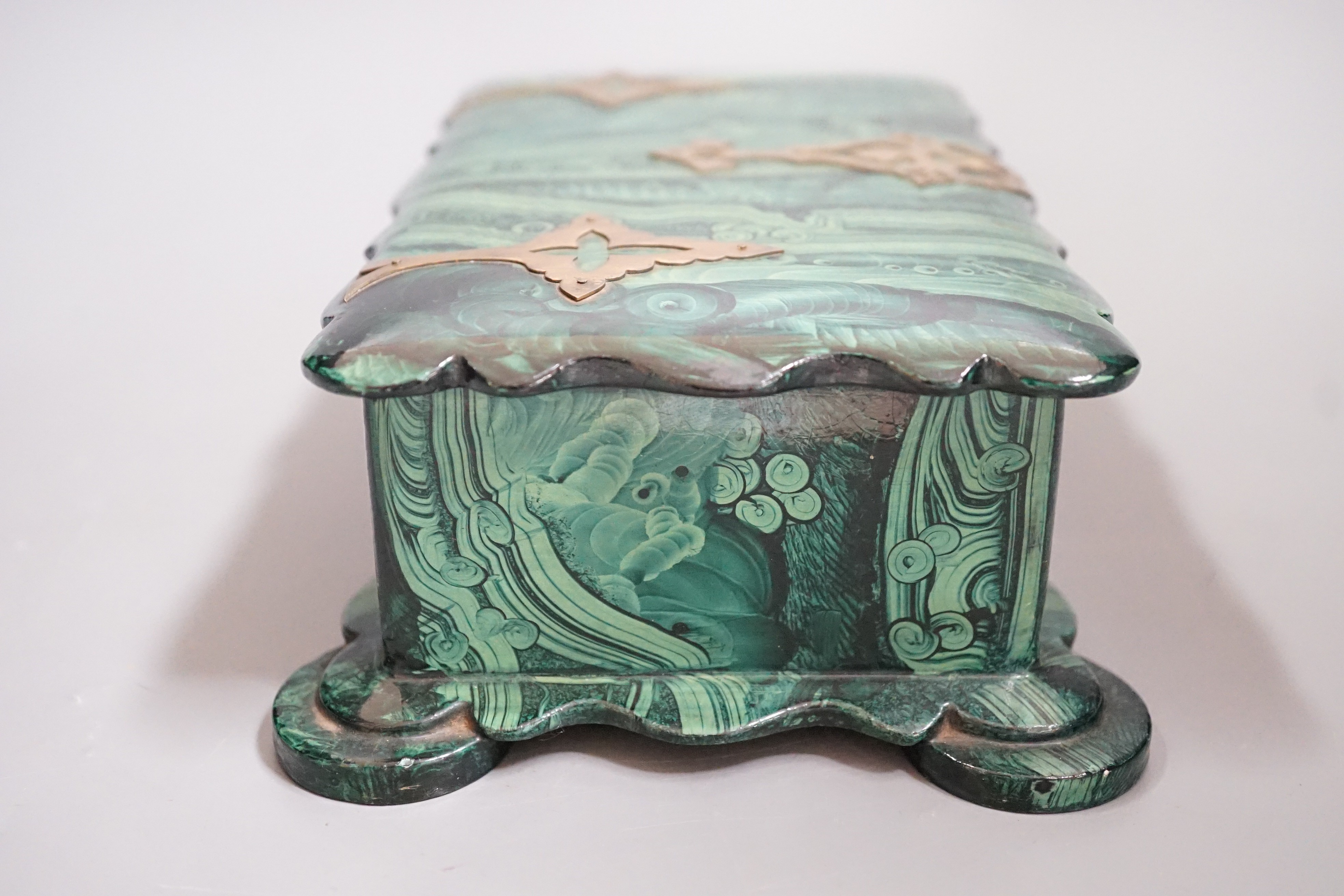A Victorian papier-mâché-mache faux malachite, brass mounted jewellery box, 21cms wide x 12.5cms deep